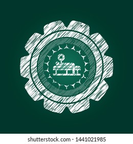bench press icon inside chalk emblem written on a blackboard