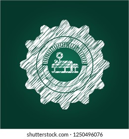 bench press icon inside chalkboard emblem