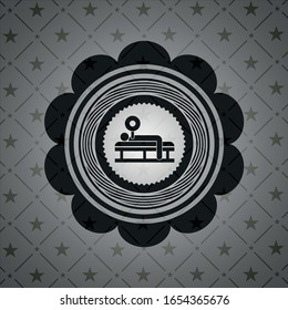 bench press icon inside dark badge or emblem