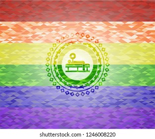 bench press icon inside emblem on mosaic background with the colors of the LGBT flag