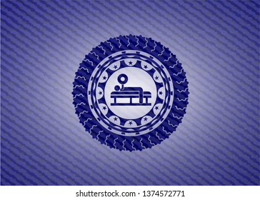 bench press icon inside emblem with denim high quality background