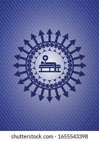 icono de prensa en banco con emblema interior con textura de denim