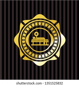 bench press icon inside gold emblem