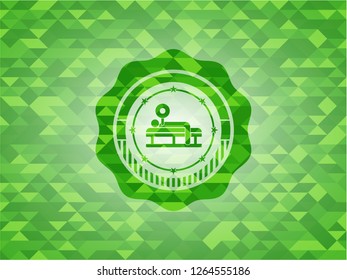 bench press icon inside green mosaic emblem