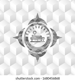 icono de prensa en banco dentro de la placa gris con fondo blanco de cubo geométrico