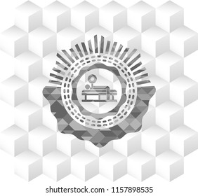 bench press icon inside realistic grey emblem with geometric cube white background