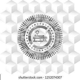 bench press icon inside realistic grey emblem with cube white background
