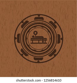 bench press icon inside realistic wooden emblem