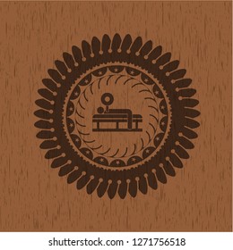 bench press icon inside realistic wooden emblem