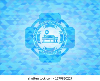 bench press icon inside realistic light blue mosaic emblem
