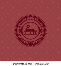bench press icon inside red icon or emblem