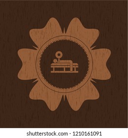 bench press icon inside retro wooden emblem