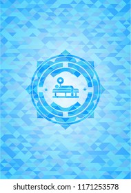 bench press icon inside sky blue emblem. Mosaic background
