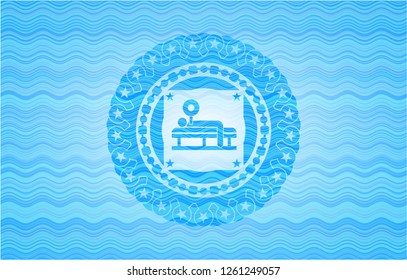 bench press icon inside water representation badge background.