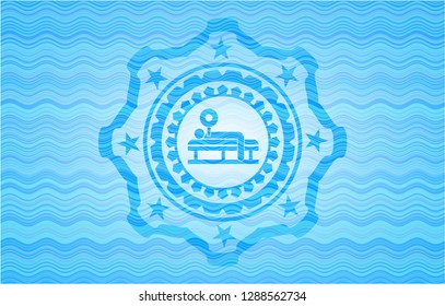 bench press icon inside water representation badge.