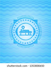 bench press icon inside water wave representation style badge.
