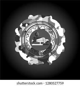 bench press icon on grey camo texture