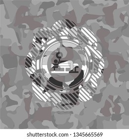 bench press icon on grey camouflage pattern