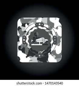 bench press icon on grey camouflaged texture