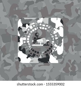 bench press icon on grey camouflaged texture