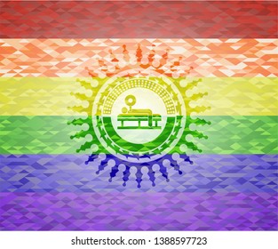 bench press icon on mosaic background with the colors of the LGBT flag