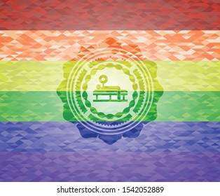 bench press icon on mosaic background with the colors of the LGBT flag