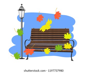 Bench wooden lantern and autumn leaves
