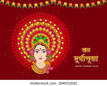 Bengali Lettering Of Happy Durga Puja Font With Goddess Durga Maa Face And Floral Garland (Toran) On Red Background.
