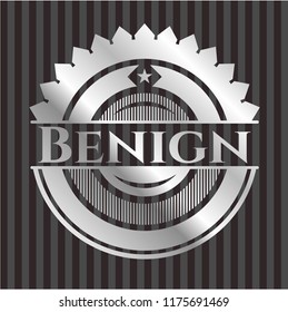 Benign silvery badge or emblem