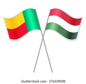 Beninese and Hungarian crossed flags. Benin combined with Hungary isolated on white. Language learning, international business or travel concept.