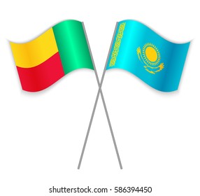 Beninese and Kazakh crossed flags. Benin combined with Kazakhstan isolated on white. Language learning, international business or travel concept.