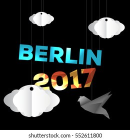 Berlin city name hanging with ropes. Low polygonal year 2017. Origami looking bird and clouds.