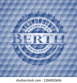 Berth blue badge with geometric pattern.