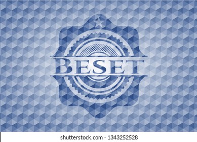 Beset blue badge with geometric pattern background.