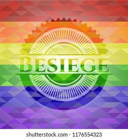 Besiege on mosaic background with the colors of the LGBT flag