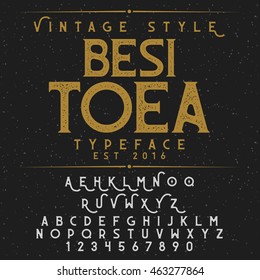 Besitoea Vintage font and sample label design. Good to use for vintage design, poster, whiskey label, logo, badge and etc.