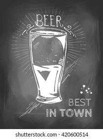 Best beer in town. Glass of beer drawn in chalk on a blackboard.