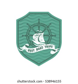 Best boat trips icon. Freehand drawn retro style steering helm, grunge ship symbol. Steering wheel vintage label. Nautical rudder shield emblem. Sea navigation element. Vector sail banner background