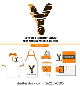 The Best and Delicious Letter Y Donuts Shop Logo for Cafe and Bakery. Bitten Chocolate Donut with Initial Lettering Logotype Vector Illustration on White Background with Brand Identity 