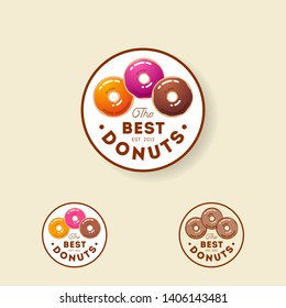 The Best Donut Logo. Bakery or Pastry Emblem. Multicolor Donuts and Letters inscribed in a circle. 