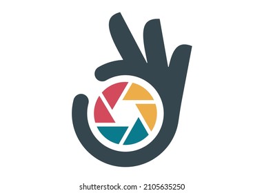 Best Photography Camera Seamless Pattern Design. Vector Pattern Template. Repeating geometric pattern illustration of a modern success emblem hand gesture silhouette and symbol of camera focus shot.