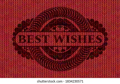 Best wishes text inside Red color woolen fabric badge. Cloth graceful background. Vector illustration. 