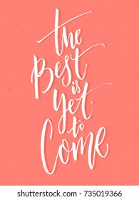 The best is yet to come. Inspirational positive quote, brush calligraphy on pink background