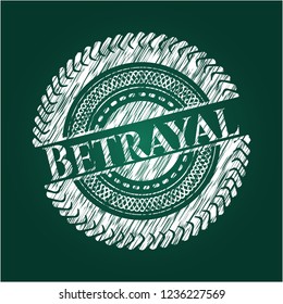 Betrayal chalk emblem written on a blackboard
