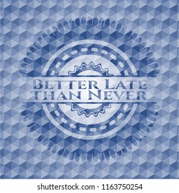 Better Late than Never blue emblem with geometric pattern.