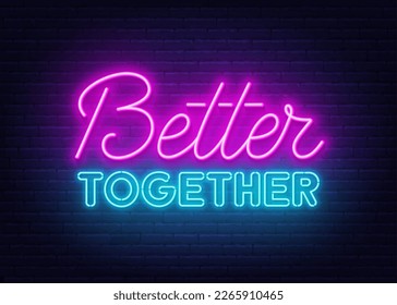 Better Together neon sign on brick wall background.