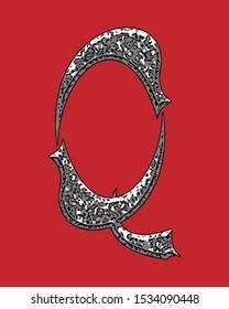 Beveled letter with coarse surface on red background.