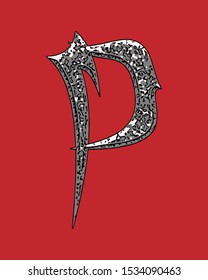 Beveled letter with coarse surface on red background.