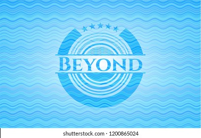 Beyond sky blue water wave emblem.