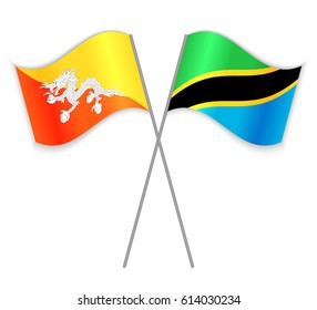 Bhutanese and Tanzanian crossed flags. Bhutan combined with Tanzania isolated on white. Language learning, international business or travel concept.
